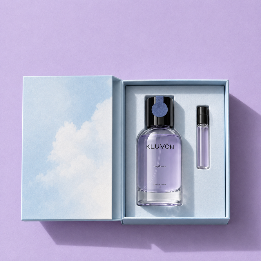 Open Kluvón box with the sealed 50 ml bottle and the 2.5 ml tester beside it